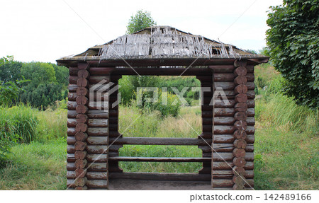 Small Timber Gazebo With Trees And Bushes On Background Outdoor Stock Image Small Timber Gazebo With Trees And Bushes On Background Outdoor Stock Image 142489166