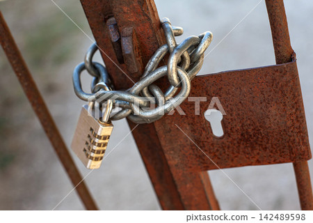 The gate is old, but the garden is secure The gate is old, but the garden is secure 142489598