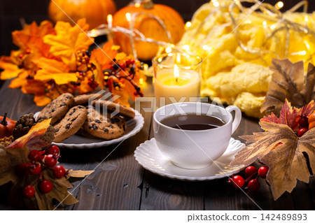 Autumn tea time with cookies and cozy decor Autumn tea time with cookies and cozy decor 142489893