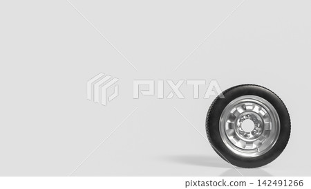 Black Rubber Tire with Shiny Silver Rim on Light Background 3d render. Black Rubber Tire with Shiny Silver Rim on Light Background 3d render. 142491266