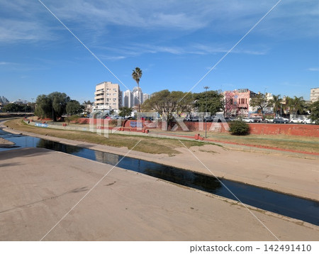 Shallow Suquia River and Cordoba Urban Landscape Shallow Suquia River and Cordoba Urban Landscape 142491410