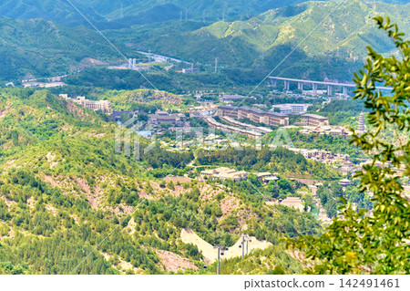 View of the water city of Gubei from the height of the Great Wall of China View of the water city of Gubei from the height of the Great Wall of China 142491461