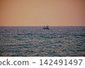 Stunning sunset over Indian Ocean on Hikkaduwa Beach Sri Lanka with calm waves 142491497
