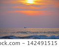 Stunning sunset over Indian Ocean on Hikkaduwa Beach Sri Lanka with calm waves 142491515