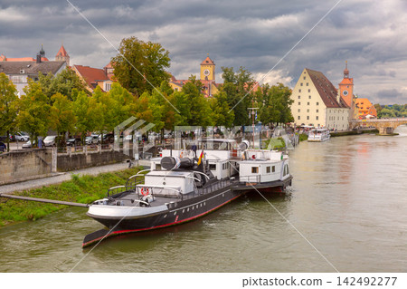 Historic Danube Riverfront with Ships in Regensburg, Bavaria, Germany 142492277
