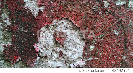 Weathered and Peeling Red Painted Wall Texture Weathered and Peeling Red Painted Wall Texture 142492595