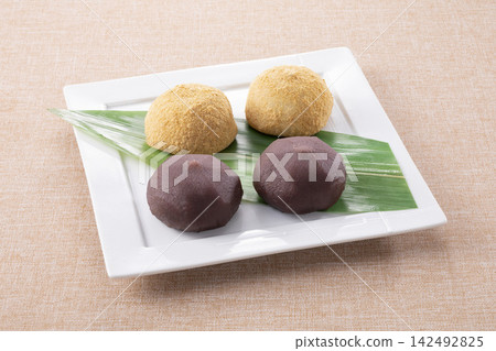 Doyo mochi (rice cakes for the summer solstice) with strained bean paste and kinako (roasted soybean flour). Doyo mochi (rice cakes for the summer solstice) with strained bean paste and kinako (roasted soybean flour). 142492825
