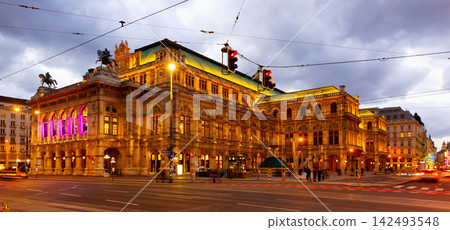 Vienna cityscape with central avenue and State Opera with evening illumination Vienna cityscape with central avenue and State Opera with evening illumination 142493548