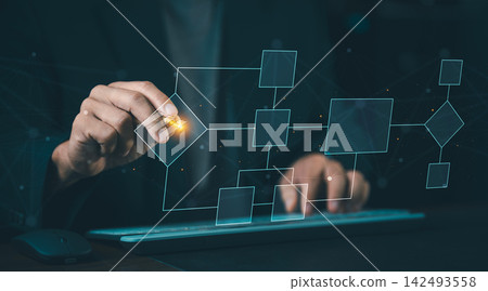 Businessman drawing virtual flowchart diagram and process management structure with stylus pen, workflow organization and system planning concept. Businessman drawing virtual flowchart diagram and process management structure with stylus pen, workflow organization and system planning concept. 142493558