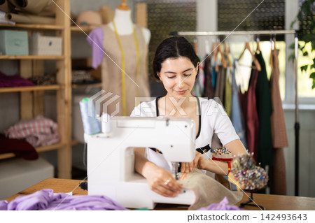 Armenian seamstress working in a workshop Armenian seamstress working in a workshop 142493643
