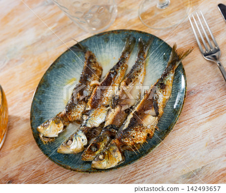 Grilled sardines on plate, grilled seafoods Grilled sardines on plate, grilled seafoods 142493657