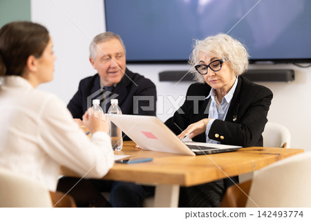 Senior business woman participate at professional community, discussing during round table talks Senior business woman participate at professional community, discussing during round table talks 142493774