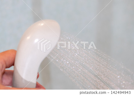 shower head spraying water shower head spraying water 142494943
