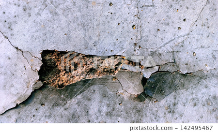 Damaged Concrete Wall with Deep Crack and Hole Damaged Concrete Wall with Deep Crack and Hole 142495467