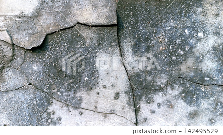 Cracked and weathered concrete surface texture Cracked and weathered concrete surface texture 142495529