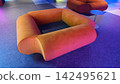 Bright orange sofa in modern indoor space 142495621