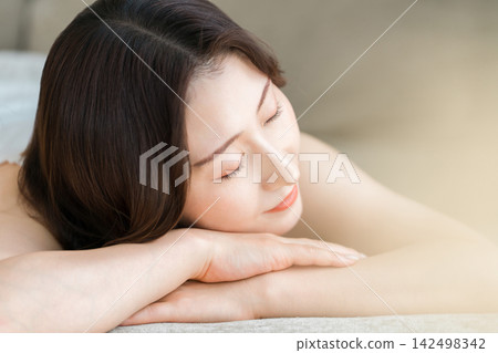 Women resting their minds and bodies through relaxation. Women resting their minds and bodies through relaxation. 142498342