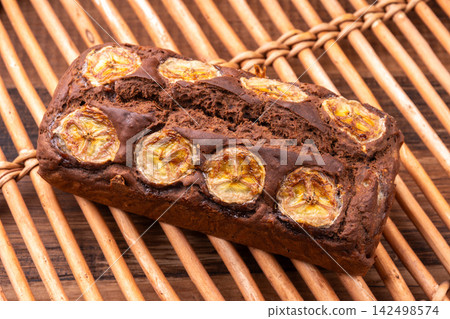 Banana cocoa pound cake Banana cocoa pound cake 142498574