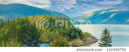 View at fjord with the beautiful mountain. The beautiful nature of Norway View at fjord with the beautiful mountain. The beautiful nature of Norway 142498738