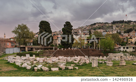 The ancient ruins of the Agora of Smyrna with the Kadifekale hillside cityscape in the background in Izmir, Turkey 142498916