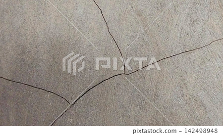 Cracks on the weathered concrete surface. Cracks on the weathered concrete surface. 142498948