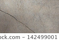 Diagonal cracks in weathered concrete surfaces. 142499001