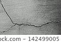 Deep structural cracks in the concrete wall. 142499005