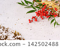 Washi paper with a background of nandina and gold decorations 142502488