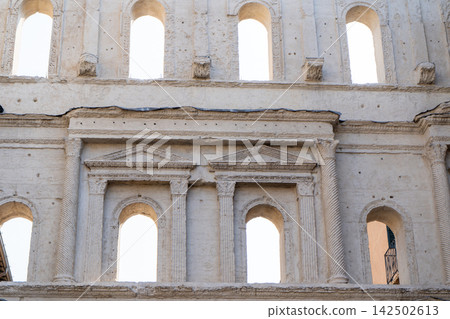 Historic Ancient Roman Porta Borsari Gate with Stone Arches and Columns on a Street in Verona, Italy Historic Ancient Roman Porta Borsari Gate with Stone Arches and Columns on a Street in Verona, Italy 142502613