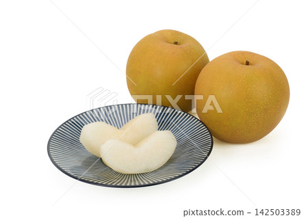 Pear cut into wedges Pear cut into wedges 142503389