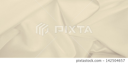 Smooth elegant golden silk or satin luxury cloth texture as wedding background. Luxurious background design. In Sepia toned. Retro style Smooth elegant golden silk or satin luxury cloth texture as wedding background. Luxurious background design. In Sepia toned. Retro style 142504657