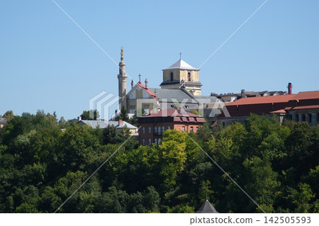 Historic Old Town Skyline of Kamianets Podilskyi with Saints Peter and Paul Cathedral and Minaret Rising Above Green Smotrych Canyon in Ukraine Historic Old Town Skyline of Kamianets Podilskyi with Saints Peter and Paul Cathedral and Minaret Rising Above Green Smotrych Canyon in Ukraine 142505593