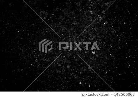 Dense falling snow particles with real snowflake shapes isolated on black background overlay Dense falling snow particles with real snowflake shapes isolated on black background overlay 142506063