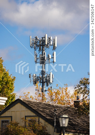 Cell Tower Above Autumn Home Before Halloween Cell Tower Above Autumn Home Before Halloween 142506147