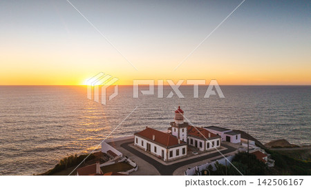 Cabo Mondego Lighthouse at Sunset Above Atlantic Ocean Cabo Mondego Lighthouse at Sunset Above Atlantic Ocean 142506167