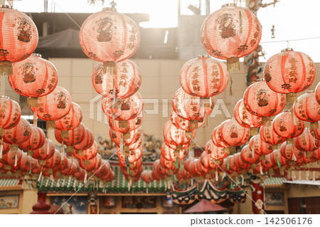 Rows of Red Chinese Paper Lanterns in Festive Indoor Display Rows of Red Chinese Paper Lanterns in Festive Indoor Display 142506176