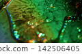 Bokeh flow. Stone texture. Defocused blue colorful paint rainbow cracked visual glint water flash bubbles on abstract art background. 142506405