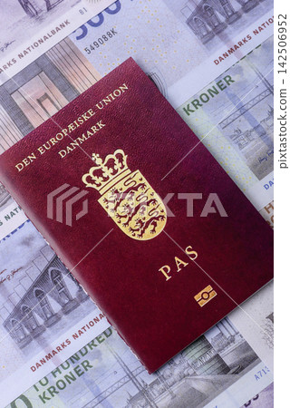 Denmark, Danish passport or id document with tickets for flight, travel. Danish passport Denmark, Danish passport or id document with tickets for flight, travel. Danish passport 142506952