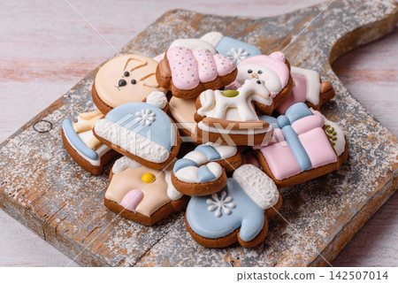 Sweet, colorful, homemade Christmas gingerbread cookies. Christmas gingerbread cookies Sweet, colorful, homemade Christmas gingerbread cookies. Christmas gingerbread cookies 142507014