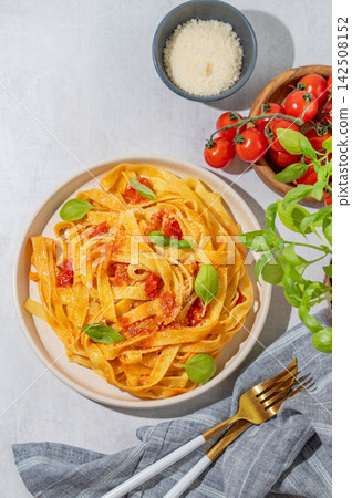 Homemade Tagliatelle Pasta with Tomato Sauce, Basil and Parmesan Homemade Tagliatelle Pasta with Tomato Sauce, Basil and Parmesan 142508152