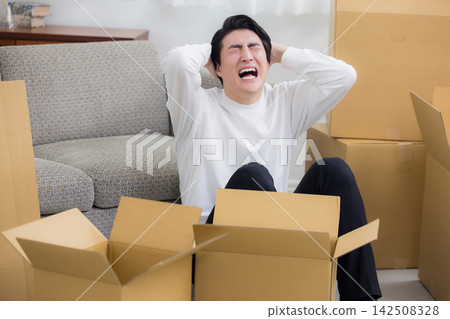 A young man moving scene A young man moving scene 142508328