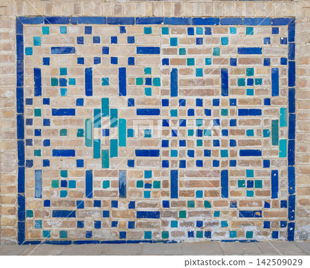 Beautiful traditional blue and yellow tiled walls and geometric patterns from Uzbekistan. Beautiful traditional blue and yellow tiled walls and geometric patterns from Uzbekistan. 142509029