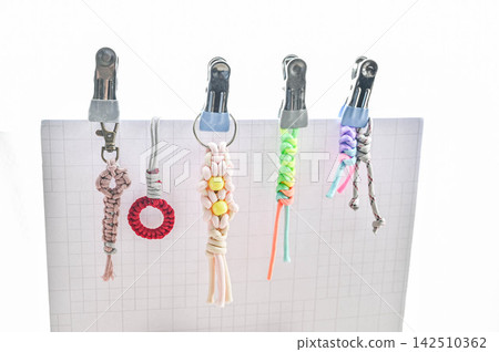 Handmade keychains made by braiding paracord Handmade keychains made by braiding paracord 142510362