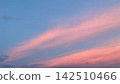 Pink clouds coloring the evening sky 142510466
