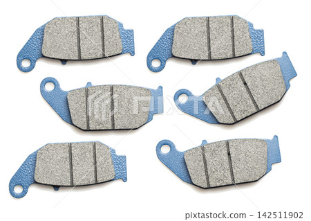 Motorcycle brake pads isolated on white background, close-up image Motorcycle brake pads isolated on white background, close-up image 142511902