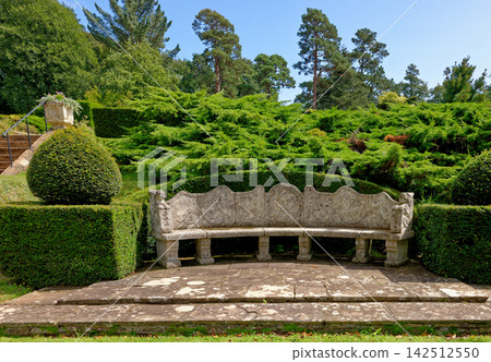 Antique Curved Stone Exedra Bench in Terraced Garden at Knightshayes Court Antique Curved Stone Exedra Bench in Terraced Garden at Knightshayes Court 142512550