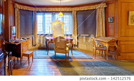 Opulent Vintage Bedroom with Golden Dressing Table and Writing Desk Opulent Vintage Bedroom with Golden Dressing Table and Writing Desk 142512576