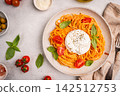 Pasta spaghetti with burrata and tomatoes 142512753