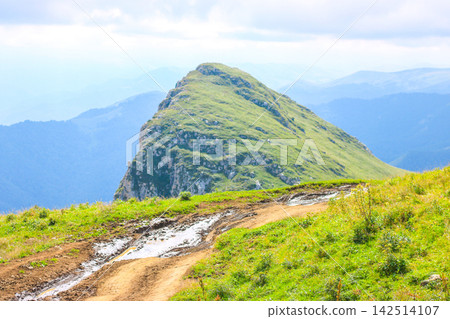 Mountain landscape viewed from above, mountain path for hiking Mountain landscape viewed from above, mountain path for hiking 142514107