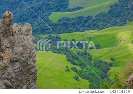 Mountain view overlooking valley and hills Mountain view overlooking valley and hills 142514109